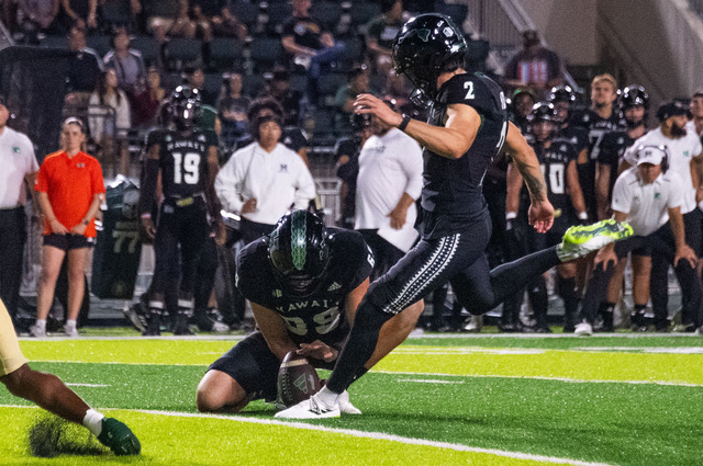 In this photo, UH’s Matthew Shipley kicks a PAT in the first half. In the second half, his kick won the game with a 51 yard field goal.