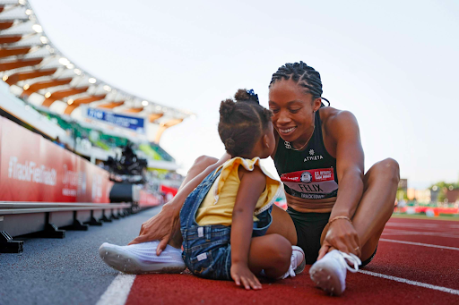 Allyson Felix with her daughter, Cammy, after qualifying for the Tokyo Olympics in 2021 in Eugene, Ore. Courtesy of Felix’s Instagram page.