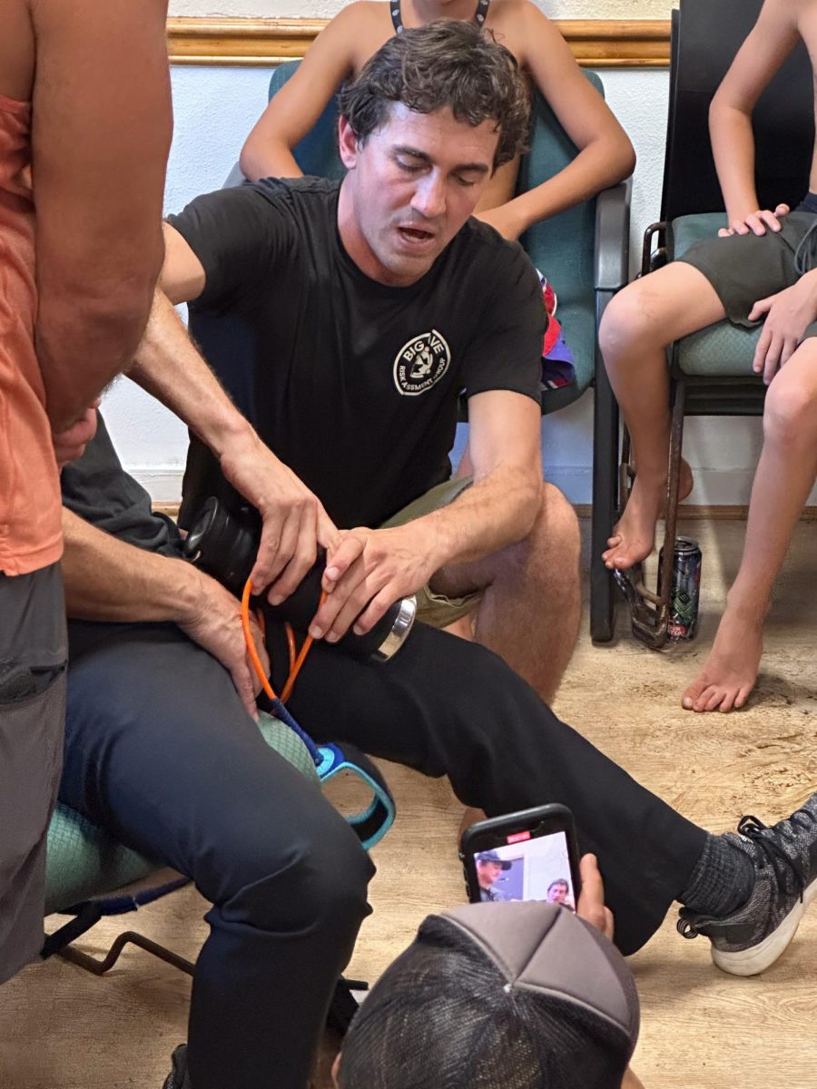Big wave surfer Greg Long demonstrates how to tie a tourniquet using a surf leash and water bottle.