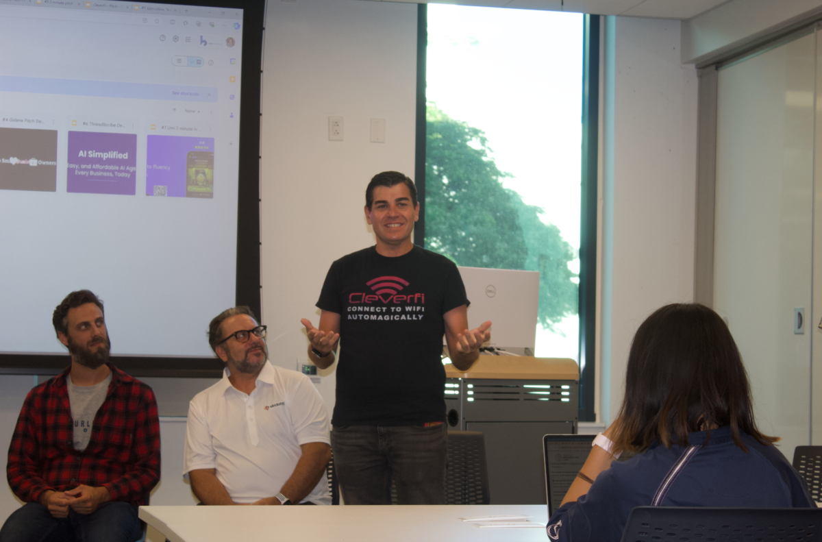 CleverFi CEO Mario Soave answers student questions at the Blue Startups Demo Night