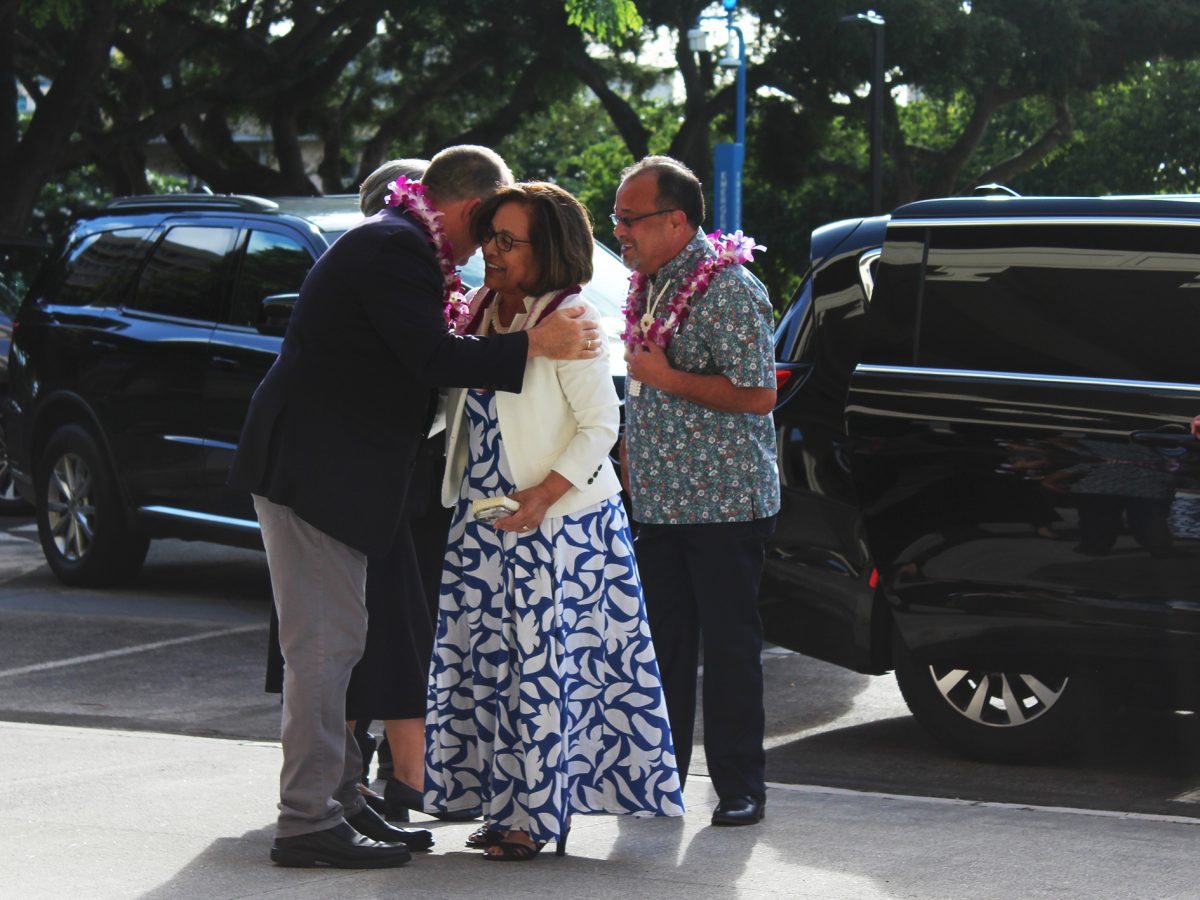 President Hilda Heine and Governor Josh Green embrace after exchanging lei, a tradition of welcome and aloha in Hawai'i.