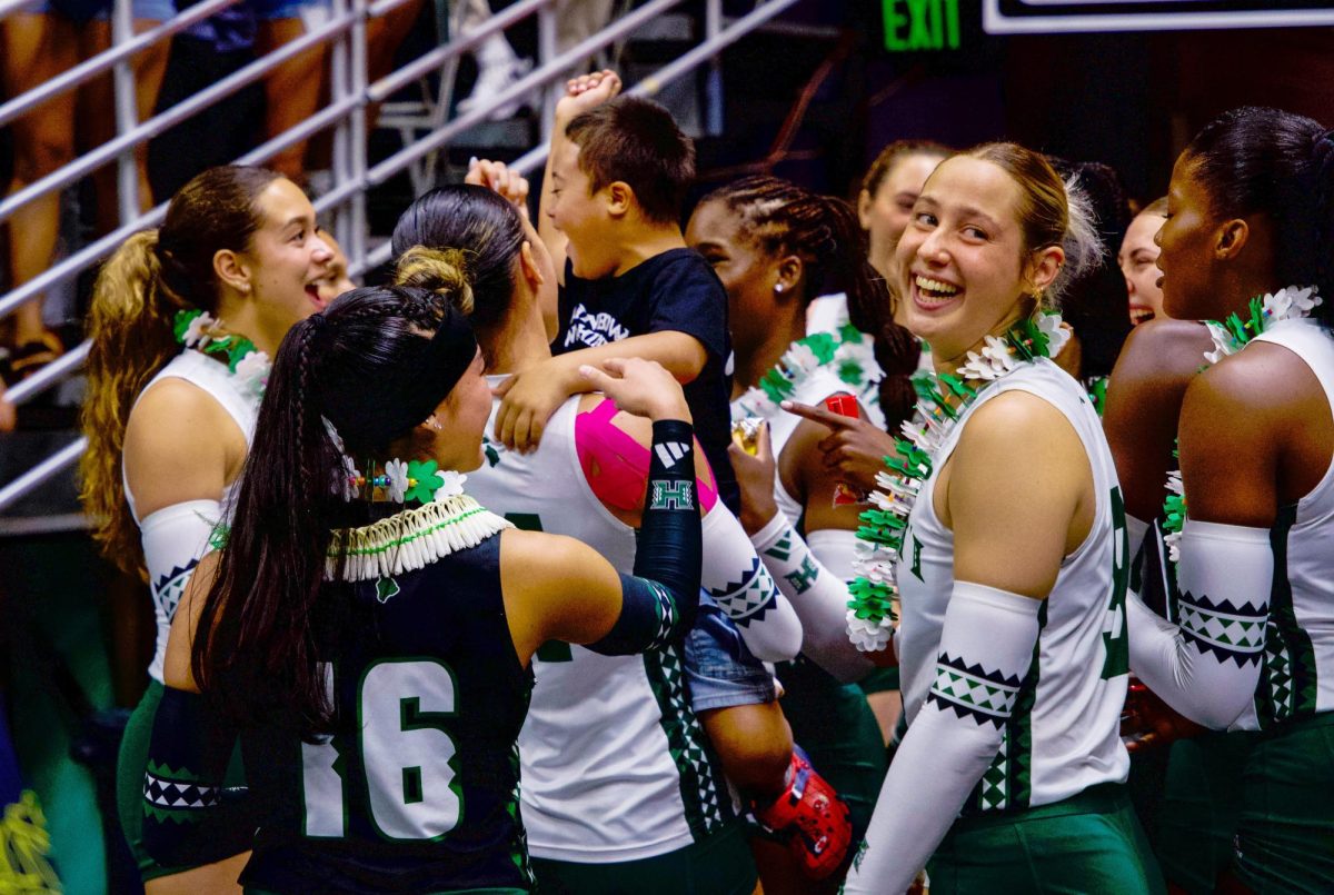 UH Wahine volleyball team sweeps UC Santa Barbara (25-14, 21, 17) at the Stan Sheriff Center, avenging their loss as they were swept at Santa Clara 3 weeks ago. Caylen Alexander took only 36 swings and had a match high 19 kills and senior setter Kate Lang tied a career high with six hills and match high 40 assists and six digs in the win against the Gauchos. After the victory, the team celebrated. On the right is a smiling Tali Hakas who had 4 kills and 8 digs.  