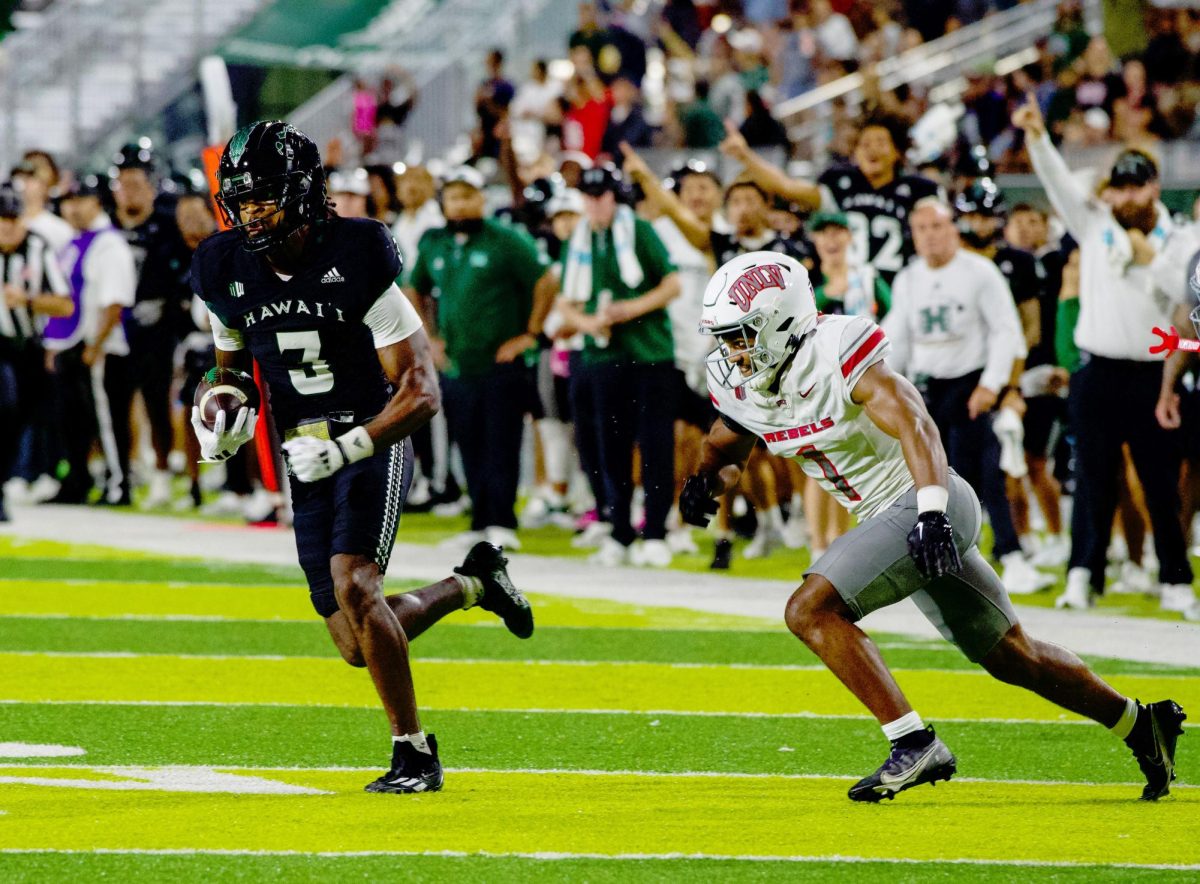 Rainbow Warrior #3: Nick Cenacle as he makes a big gain during the fourth quarter  of the UHM/UNLV Football game.