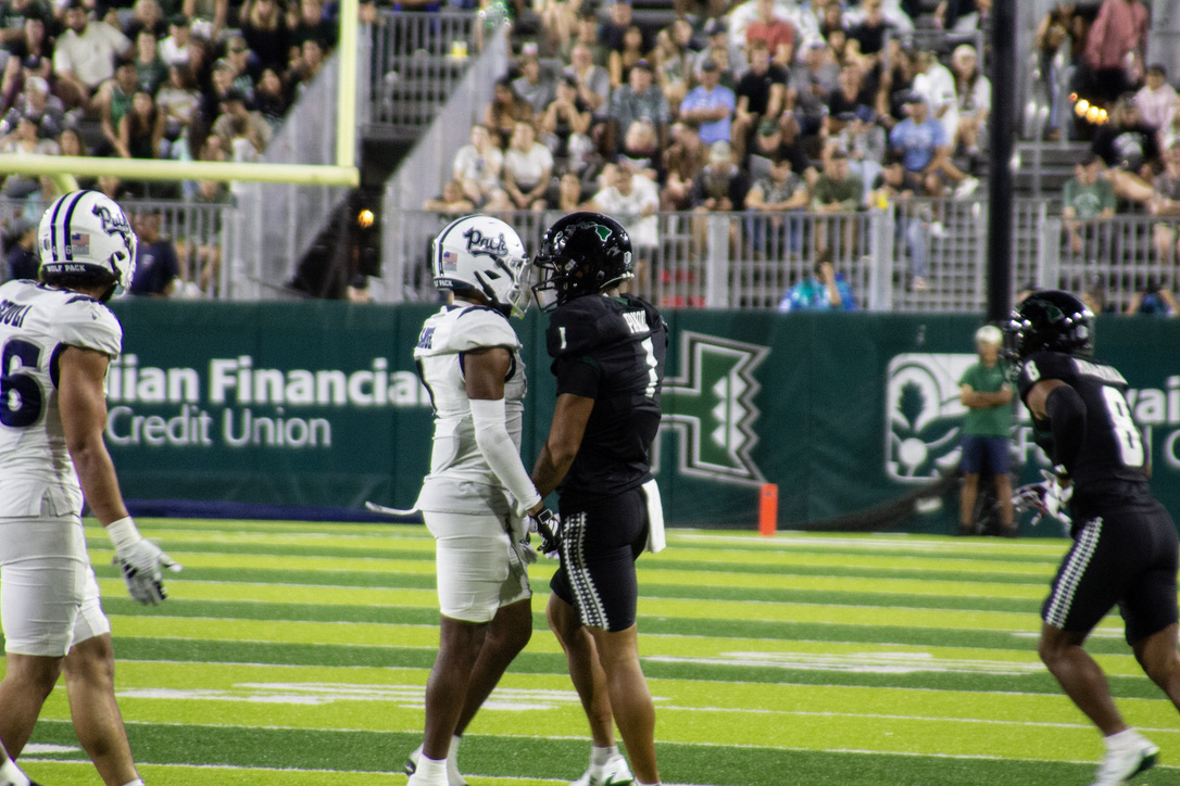 Rainbow Warrior #1: Jonah Panoke exchanging words with a Nevada Wolf at the UHM/Nevada Football game.