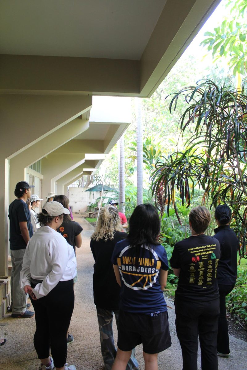 Students gather to hear Arby Barone’s lecture on different plant species throughout the garden.